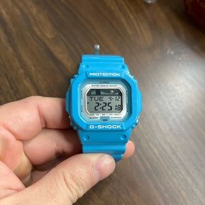 Blue Casio G-Shock digital watch